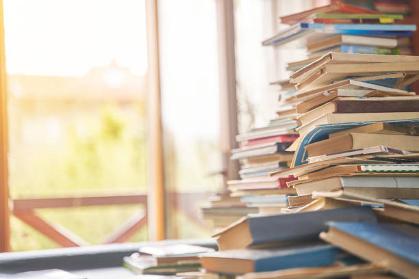 istock pile of old books on the table 1223595937