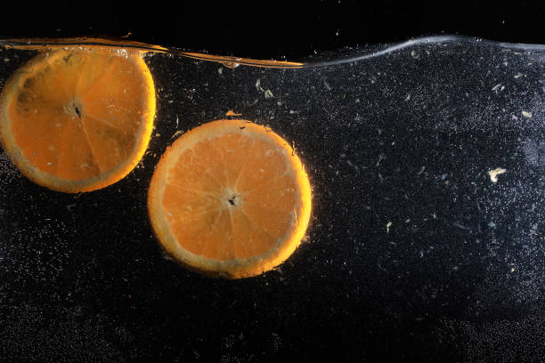 istock Water drops on ripe sweet orange. Fresh mandarin background with copy space for your text. Vegetarian concept. 1223596776