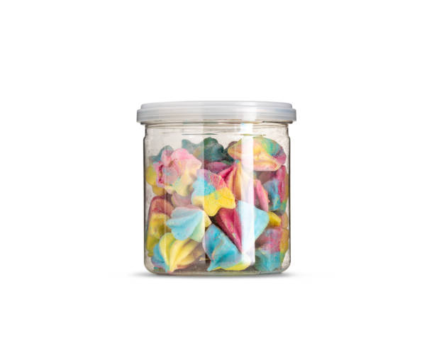 istock pastel colour Meringue in bottle on white background 1223597433