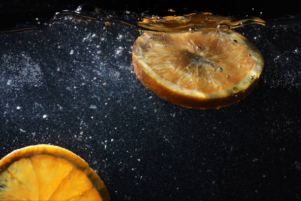 istock Water drops on ripe sweet orange. Fresh mandarin background with copy space for your text. Vegetarian concept. 1223599896