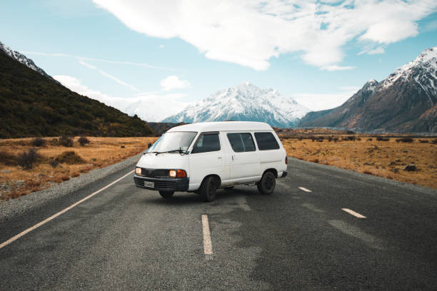 Old Toyota camper van turning around in the middle of the road on the way to Mt. Cook. Taken in the winter of 2019.