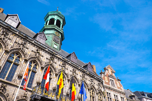 Facade of the City Hall of the city of Mons (Belgium), in the main square. The Town Hall consists of a remarkable collection of various buildings, and today it is one of the most notable examples of the city's heritage.