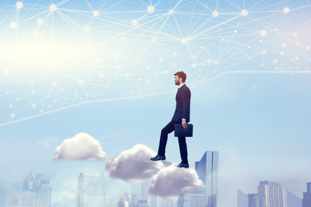 istock Businessman pressing virtual buttons in the sky 1223604058