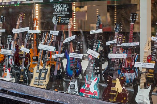 Musical instruments for sale in a shop in London's Charing Cross Road, including from George Harrison