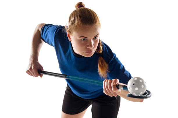 istock Floorball female player isolated on white studio background, action and motion concept 1223605746