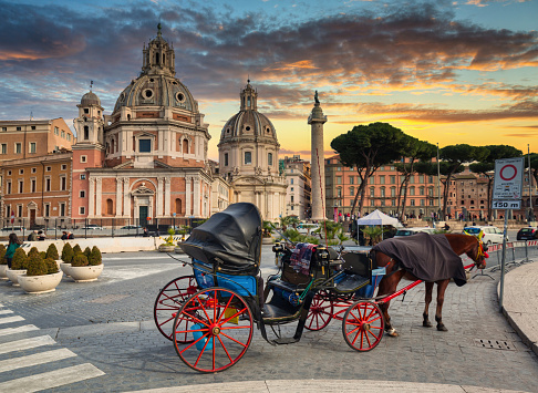 Horse carriage in the old town of Rome at sunset, Italy