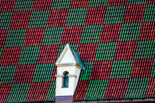 red-green tile with a window