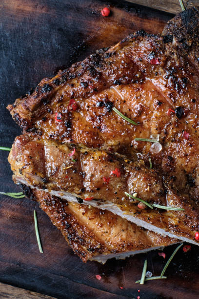 istock Pork Meat Chop Cooked On The Barbecue Grill. On dark background. Top view 1223608362