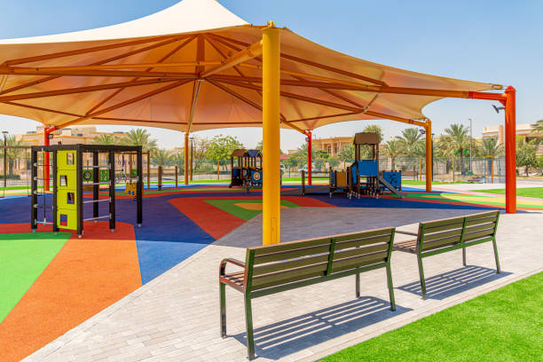 istock Small public parks placed next to the mosque completely shaded with rubber flooring equipped with the modern play structures 1223612707