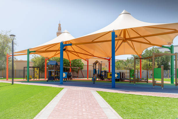 istock Small public parks placed next to the mosque completely shaded with rubber flooring equipped with the modern play structures 1223612739