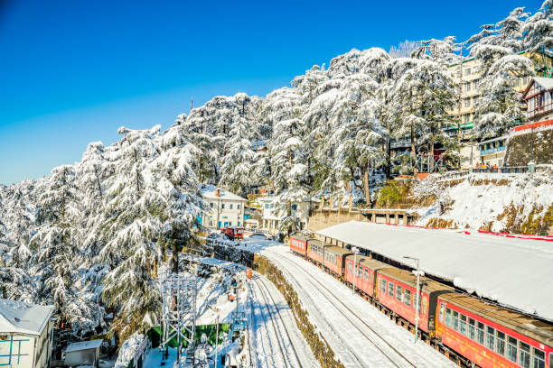 The Kalka to Shimla railway is a 2 ft 6 in (762 mm) narrow-gauge railway in North India which traverses a mostly-mountainous route from Kalka to Shimla. The Kalka to Shimla railway is a 2 ft 6 in (762 mm) narrow-gauge railway in North India which traverses a mostly-mountainous route from Kalka to Shimla. shimla stock pictures, royalty-free photos & images