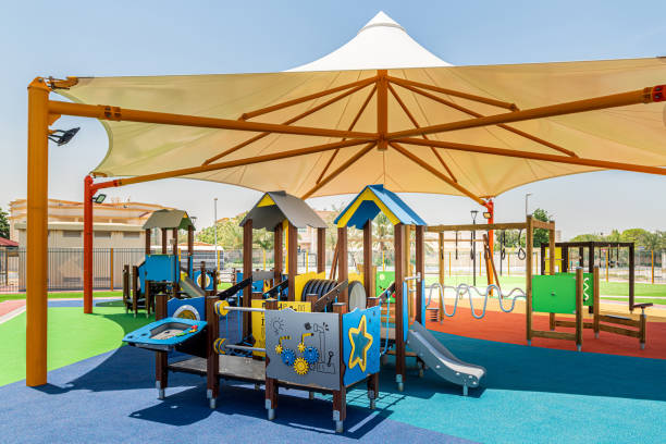 istock Small public parks placed next to the mosque completely shaded with rubber flooring equipped with the modern play structures 1223612829