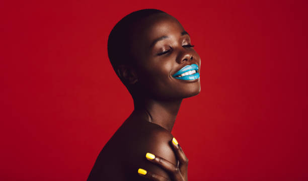 istock Beautiful african woman with colorful makeup 1223617844