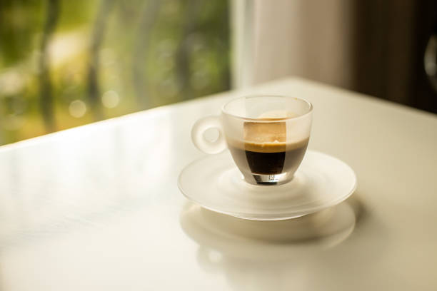 istock Espresso in a glass cup shot on sunlight 1223618773