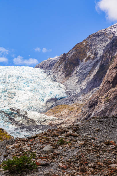 南島。フランツ・ジョセフ氷河の肖像画。ニュージーランド - falling glacier snow alp ストックフォトと画像