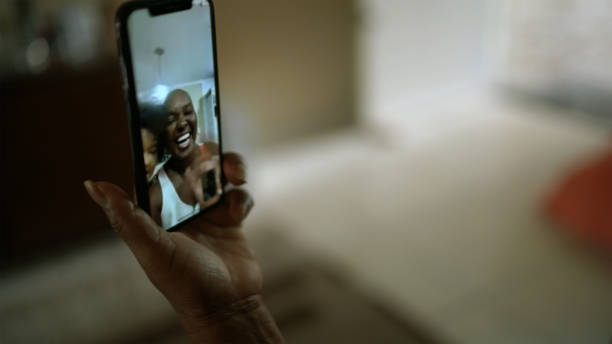 istock Mobile screen on a family video chat at home 1223619213