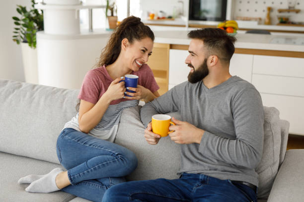 istock Couple relaxing on sofa in their new home 1223619544