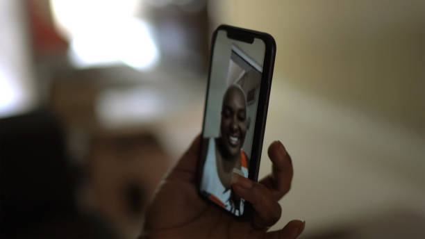 istock Mobile screen on a family video chat at home 1223620263