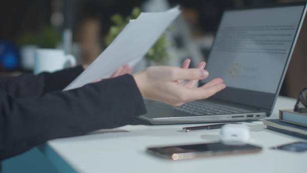 istock Employee throws report on boss table. Close up 1223622039