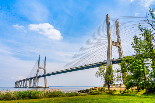 Lisbon, Portugal: Vasco da Gama bridge, a cable stayed bridge flanked by viaducts and rangeviews that spans the Tagus river in Parque das Nacoes