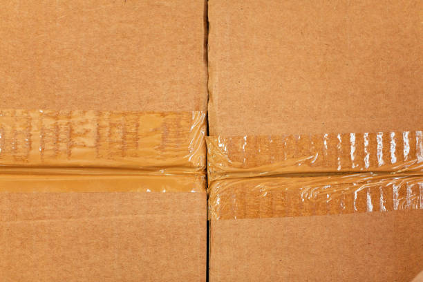 istock Modern warehouse shelves with pile of cardboard boxes 1223623794