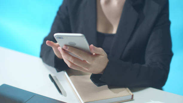 istock Female boss calls and talks on the phone. Sliding 1223625217