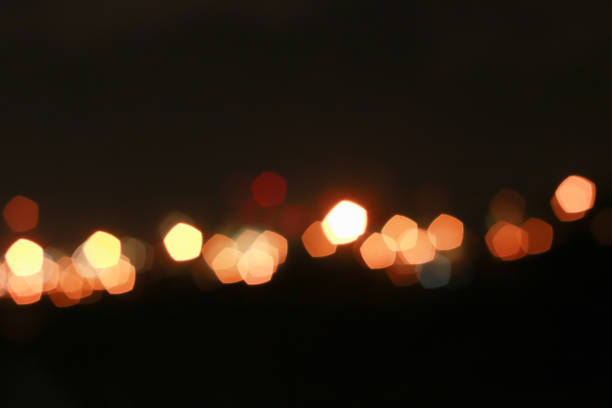 Red and orange Bokeh pentagon for background, glitter light Defocused and Blurred Bokeh, Colorful.
