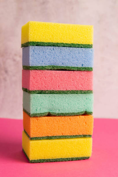 istock Colorful cleaning set for different surfaces in kitchen, bathroom and other rooms. Cleaning service concept. Early spring regular clean up. Top view, close-up 1223627455