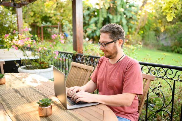 istock Man Working From Laptop at Home in South Africa 1223630627