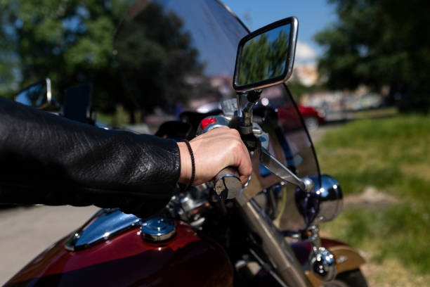 istock Biker riding on a motorcycle. View of a hand on handlebar giving gas 1223632149
