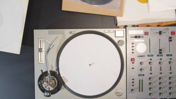 istock The musician examines vinyl records. Top view 1223634011