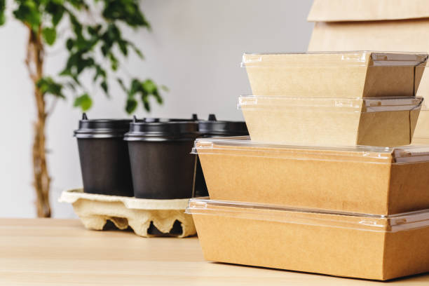 Assortment of various food delivery containers on table