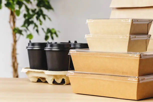Photo of Assortment of various food delivery containers on table