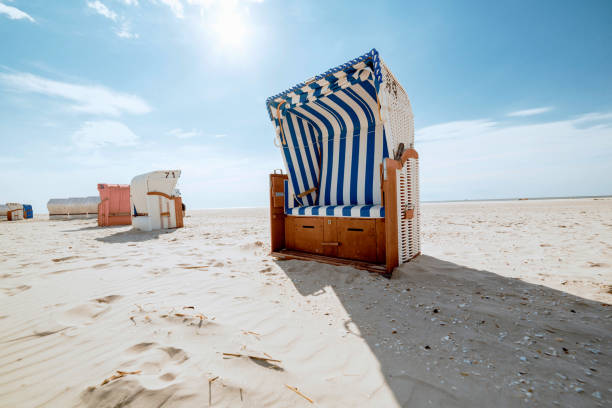 istock Blue and white striped beach chair or bench 1223637988