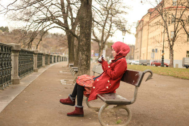 asian hijab traveler enjoy autumn season beside the Vltava river, in Prague asian hijab traveler enjoy autumn season beside the Vltava river, in Prague muslim photographer stock pictures, royalty-free photos & images