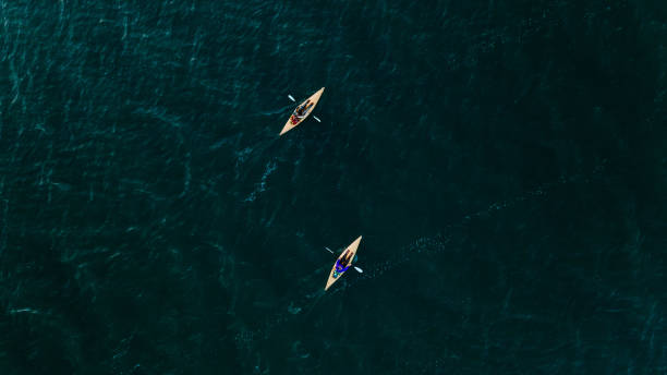 istock Aerial view of people doing sea kayaking 1223642321