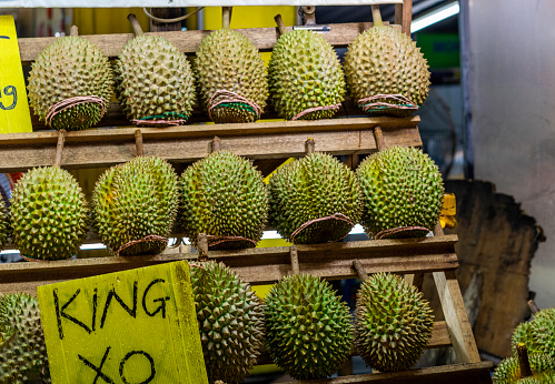 A Malaysian night market stall filled with Musang king durian.