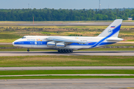 Houston, United States - May 4, 2020:  The Russian built, Ukrainian operated AN-124; one of the largest cargo planes in the world, landing at the George Bush Intercontinental Airport in Houston, Texas.