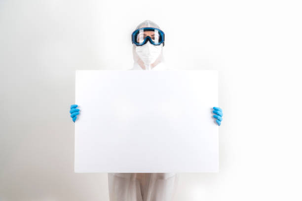 istock Medical worker holding a white board. 1223652025