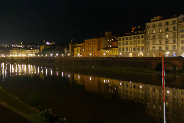 istock Florence Firenze Arno river at night in Italy; 1223653458