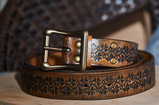 istock thick lap leather belt with a drawing close-up 1223656515