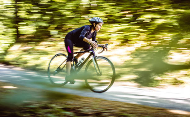 istock Woman Cycling in Nature, Blurred Motion 1223660827