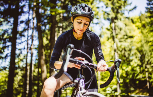 istock Woman Cycler Taking a Break, Relaxing 1223663662