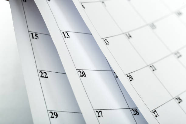 istock Closes a calendar page in blue. flipping calendar 1223666733