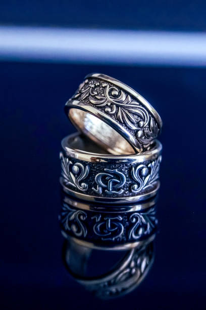istock Wedding silver rings on glass 1223668069