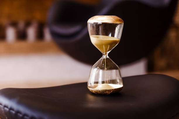 istock large hourglass clock in the office 1223669205