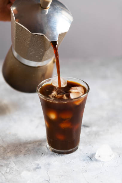 istock tall glass cold brew coffee with ice on black or dark background 1223673149