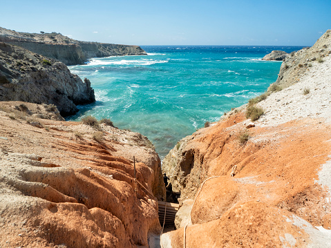 Ladder to climb down to Tsigrado Beach at Milos Island - Greece