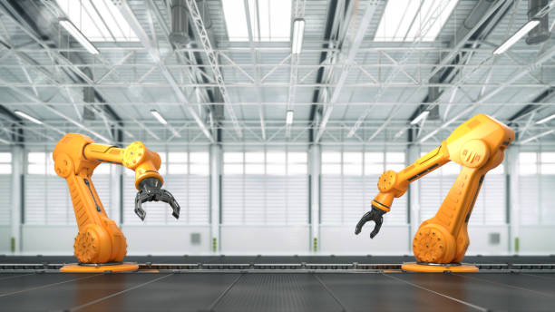 istock Two autonomous industrial robotic hand with conveyor belts at factory general interior view. 1223676459