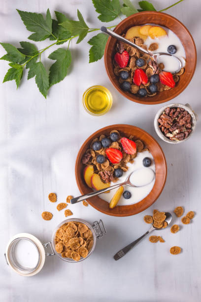 istock Health plate cereal strawberries yogurt tablecloth 1223676652